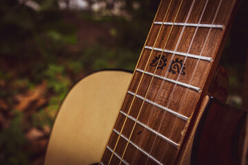 Obraz premium neck and acoustic guitar body with nylon strings