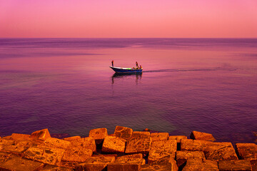 Artistic landscape shot of a boat on Alexandria's Beach