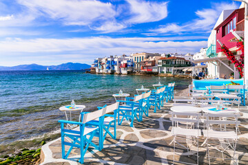 Mykonos island,Cyclades. Greece summer holidays. Bars by the sea in famous popular place 