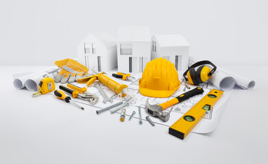 House construction plan concept. Tools for building work. Architectural model houses, yellow hard...