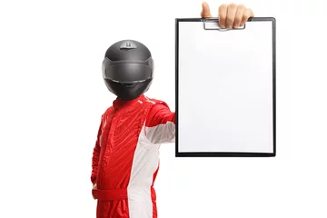 Gartenposter Motorsport racer with a helmet holding a clipboard with a blank document © Ljupco Smokovski