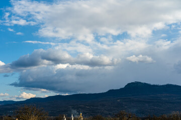 Beautiful dramatic sky over valley hills