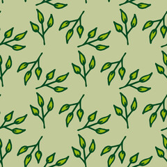 Seamless pattern with spring green leaves on light green background. Doodle style. Vector image.