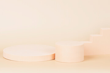 Abstract composition with geometric shapes forms. Exhibition podium, platform on pastel beige background. Front view