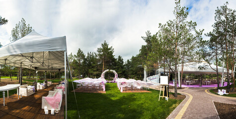 Outdoor wedding ceremony and banquet wedding tent