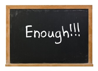 Obraz premium Enough written in white chalk on a black chalkboard isolated on white