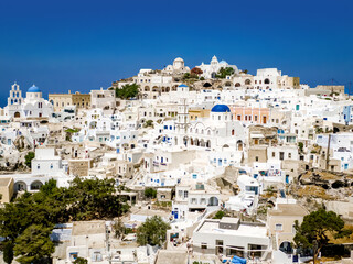 Aerial view of Greek village with white houses. Pyrgos Kallistis, Santorini, Greece.