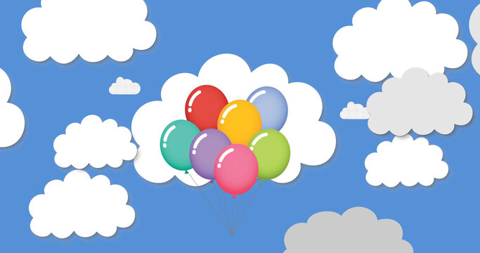 Image of flying balloons over clouds on blue background