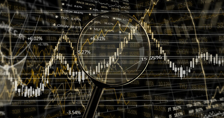 Image of magnifying glass over financial data processing