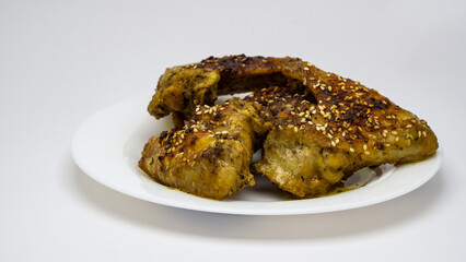 appetizing chicken wings on a white plate