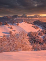 Fotobehang Jamnik on a beautiful winter morning with fresh snow and a vivid sunrise.   © gljivec