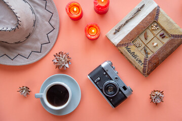 old camera. coffee hat, travel accessories. flat lay. tourist tour