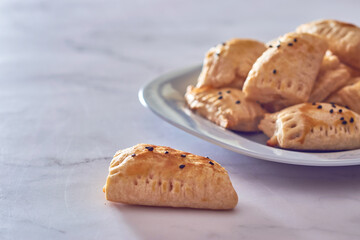 Sandwiches for events made of puff pastry and filled with cheese