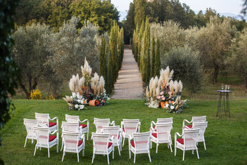 Outdoor wedding ceremony in the olive garden
