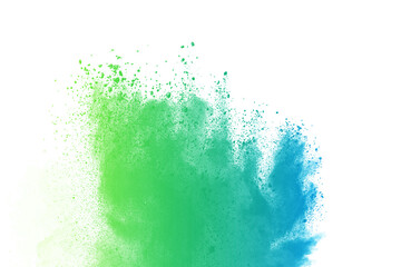 Abstract blue green powder explosion on white background.Freeze motion of blue green dust cloud.