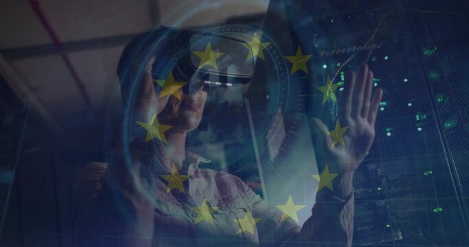 Animation of european union stars and data over caucasian woman with vr headset by computer servers