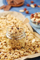 Fototapeta na wymiar Homemade granola with nuts and chocolate