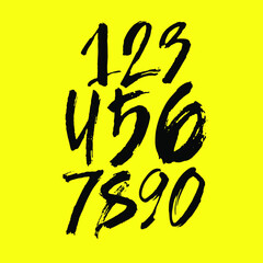 set of calligraphic acrylic or ink numbers. ABC for your design, brush lettering on a yellow background