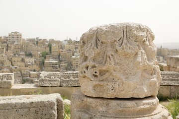 Details of ruins of Temple of Hercules in Citadel Jebel Al Qala'a in Amman, Jordan. Panorama of...