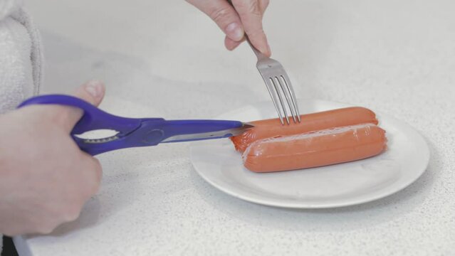 cut the sausage casing with kitchen scissors