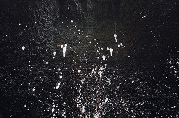 Abstract texture. Paint spots wall. Black texture. Stone background. Dark marble. Rock texture. Rock surface with cracks. Rock pile. Grunge Rough structure.