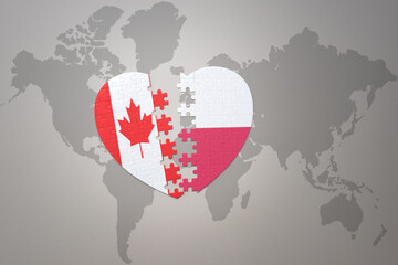 puzzle heart with the national flag of canada and poland on a world map background.Concept.