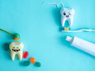 A yellow tooth cries next to sweets and sweets, a white tooth smiles next to a toothpaste and a...