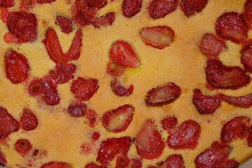 Pie with fresh strawberries and sponge dough. Recipe of homemade food concept. Top view. 