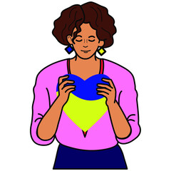 the girl hugs the heart of the colors of the flag of Ukraine