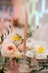 Bouquet of flowers in vase on the wedding table