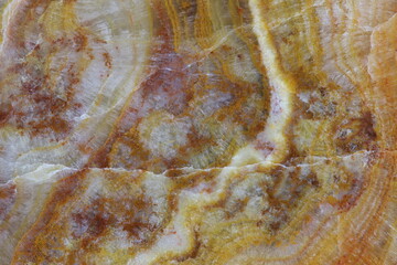 The texture of natural polished smooth natural marble stone Onyx. For abstract home decoration, close-up.