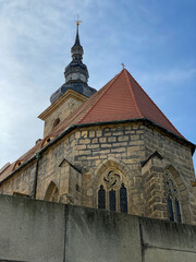 Fototapeta na wymiar Beatiful european church behind wall