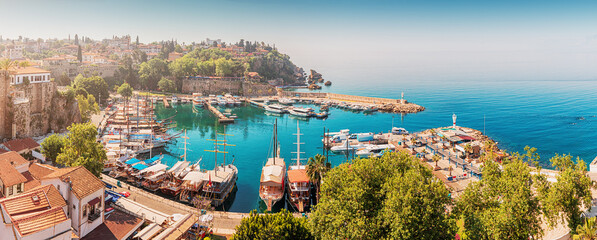 Aerial view of the picturesque bay with marina port with yachts near the old town of Kaleici in Antalya. Turkish Riviera and resort paradise - obrazy, fototapety, plakaty