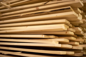 Lots of boards. Boards are stacked. Building materials.