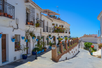 Mijas, Spain, 28.05.2022: narrow streets, balconies and decorated houses of the city in the mountains.