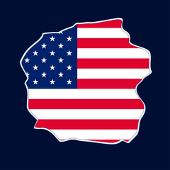  A fallen piece of the wall and the flag of the United States of America.