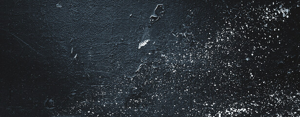 Abstract texture. Paint spots wall. Black texture. Stone background. Dark marble. Rock texture. Rock surface with cracks. Rock pile. Grunge Rough structure.