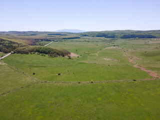 Fototapeta premium Aerial view of rural land near town of Godech, Bulgaria
