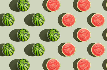 Pattern of watermelon on green pastel background