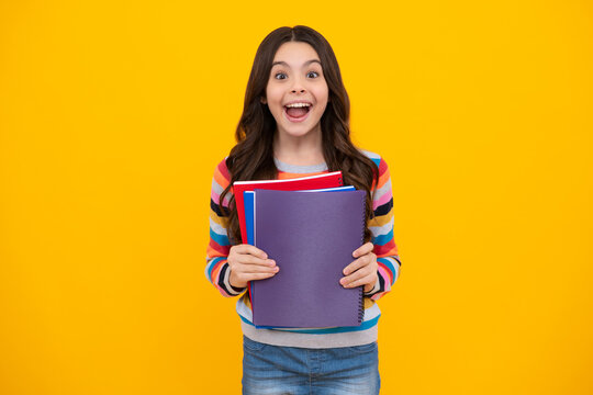 Schoolgirl With Copy Book Posing On Isolated Background. Literature Lesson, Grammar School. Intellectual Child Reader. Happy Teenager, Positive And Smiling Emotions Of Teen Girl.