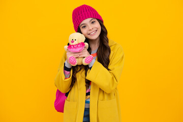 Winter school. Funny school girl with toy. Happy childhood and kids education. Knowledge day. Happy teenager, positive and smiling emotions of teen girl.