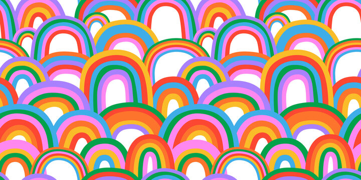 Diverse colorful rainbow doodle seamless pattern illustration. Multi color rainbows cartoon in funny hand drawn style. LGBT issues or diversity spectrum background concept.