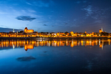 Fototapeta premium Night view of the old town country Torun, Kuyavian-Pomeranian Voivodeship, Poland 