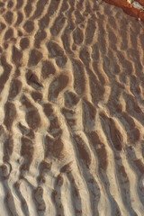 sand that forms waves, due to waves of water currents. natural background