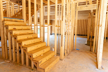 New house residential construction  framing with stairs.