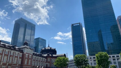 Fototapeta na wymiar Tokyo sky year 2022 with Tokyo station and Marunouchi buildings in the back, June 4th summer