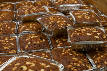 Kolkata, West Bengal, India - 29th Dcemeber 2019 : Plain plum Cakes are being sold at Nahoum and Sons, 100 years old heritage cake shop at New Market area. Cakes are considered as heritage of Kolkata.