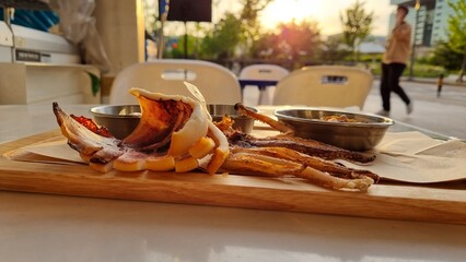 Delicious squid snacks at sunset
