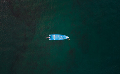 Drone picture of boat in the middle of the sea