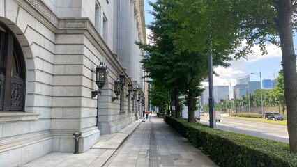 Street of central Tokyo station area, next to the Imperial palace, urban city environment, shot taken on sunny Saturday year 2022 June 4th